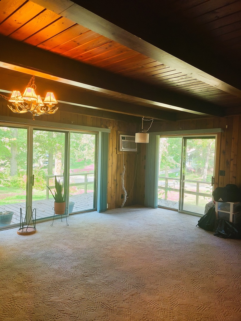 110 Hickory Lane Dixon, IL 61021 - Photo 5 of 24 a view of an empty room with a window