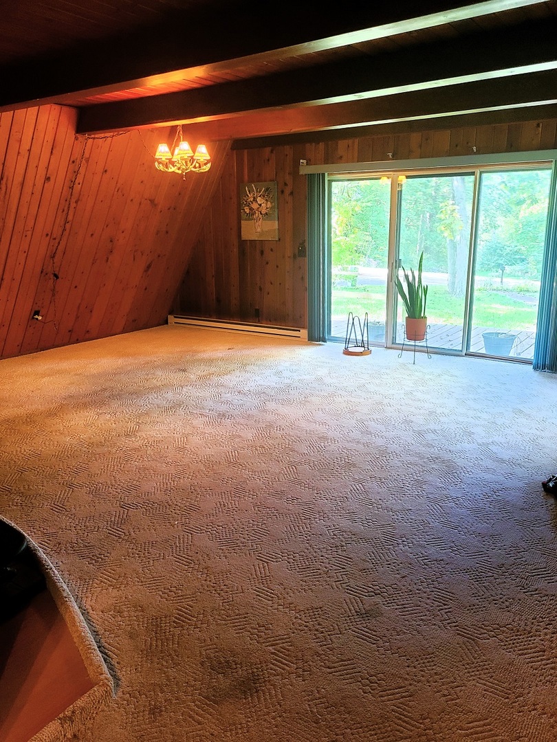 110 Hickory Lane Dixon, IL 61021 - Photo 6 of 24 a view of an empty room with a window