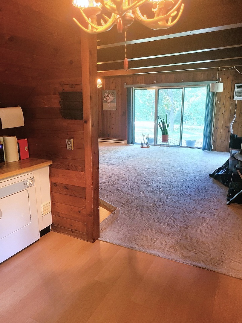 110 Hickory Lane Dixon, IL 61021 - Photo 7 of 24 a view of a room with gym equipment and a large window