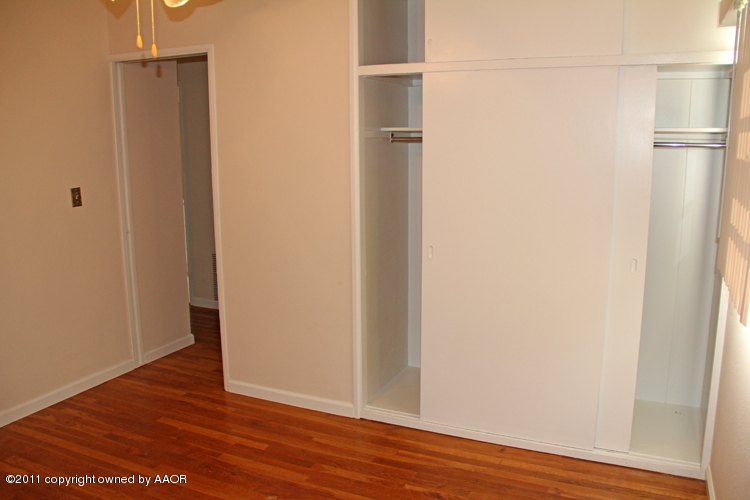 5127 Crockett Street Amarillo, TX 79110 - Photo 12 of 25 a view of a small space with wooden floor