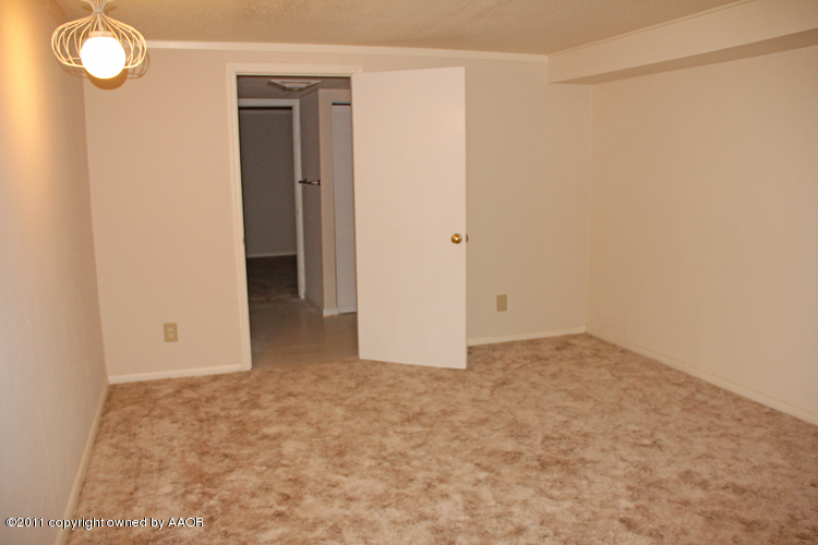 5127 Crockett Street Amarillo, TX 79110 - Photo 15 of 25 a view of an empty room