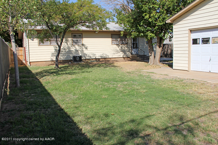 5127 Crockett Street Amarillo, TX 79110 - Photo 25 of 25 a view of a house with a yard