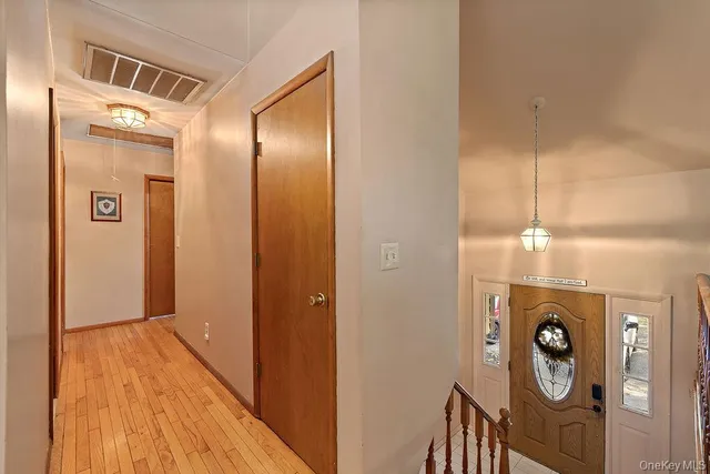 a bathroom with a shower curtain and a sink