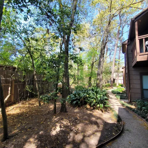 a view of a back yard of the house