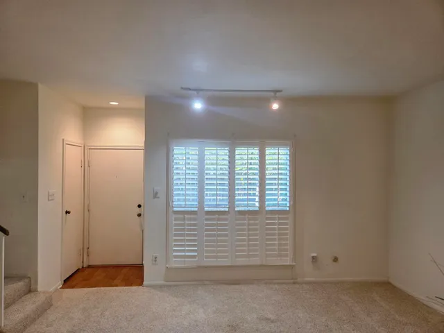 an empty room with windows