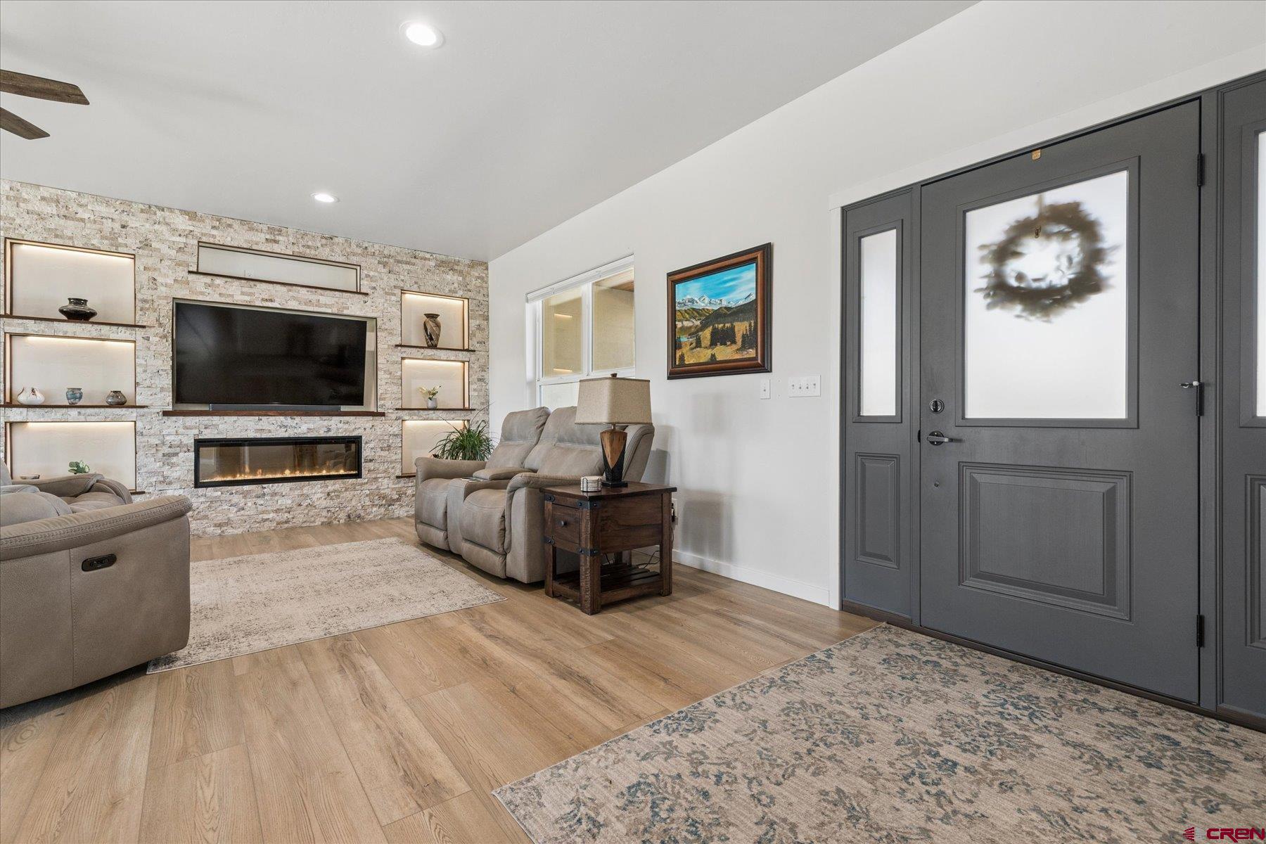1937 Golf Course Lane Cortez, CO 81321 - Photo 29 of 31 a living room with furniture and a flat screen tv
