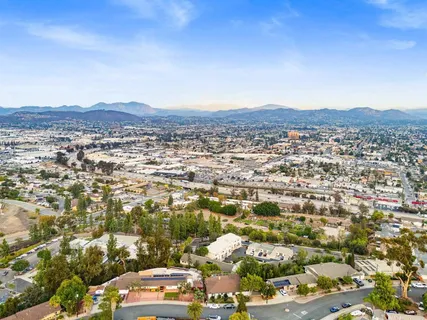 an aerial view of residential house and outdoor space