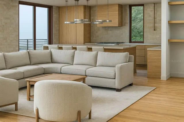 a view of a dining room with furniture and chandelier