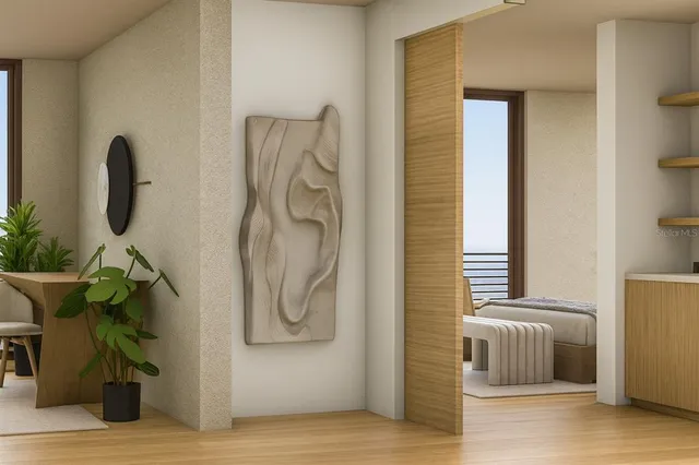 a bedroom with a bed and a couch