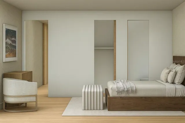 a white bath tub sitting next to a white toilet