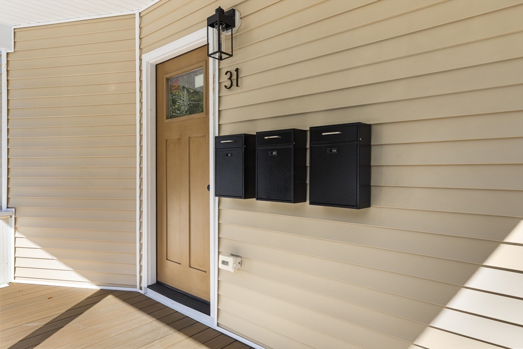 31 Woodale Avenue, Unit 1 Boston, MA 02126 - Photo 15 of 22 a view of a door