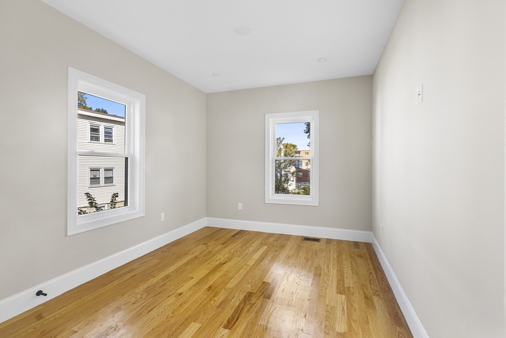 31 Woodale Avenue, Unit 1 Boston, MA 02126 - Photo 10 of 22 a view of a room with window