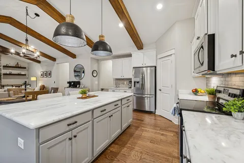 a white bath tub sitting in a bathroom