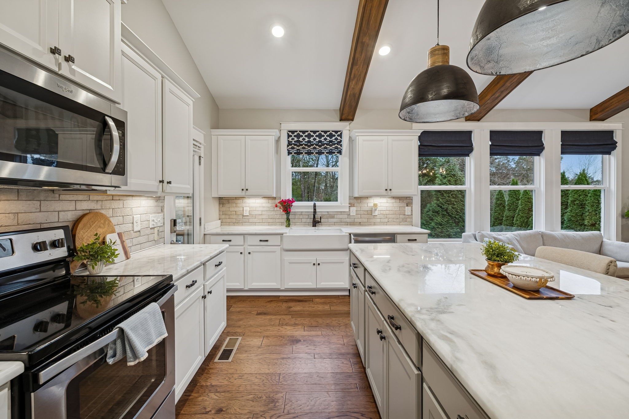 238 Caroline Way Mount Juliet, TN 37122 - Photo 18 of 51 a kitchen with a sink stove top oven and microwave