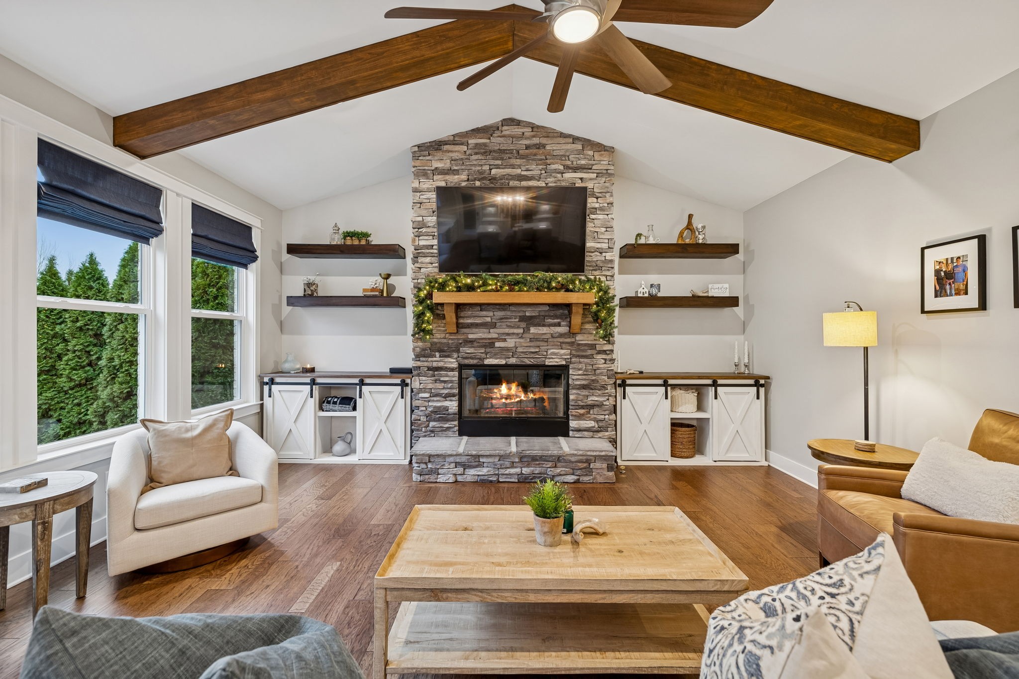 238 Caroline Way Mount Juliet, TN 37122 - Photo 10 of 51 a living room with furniture and a fireplace