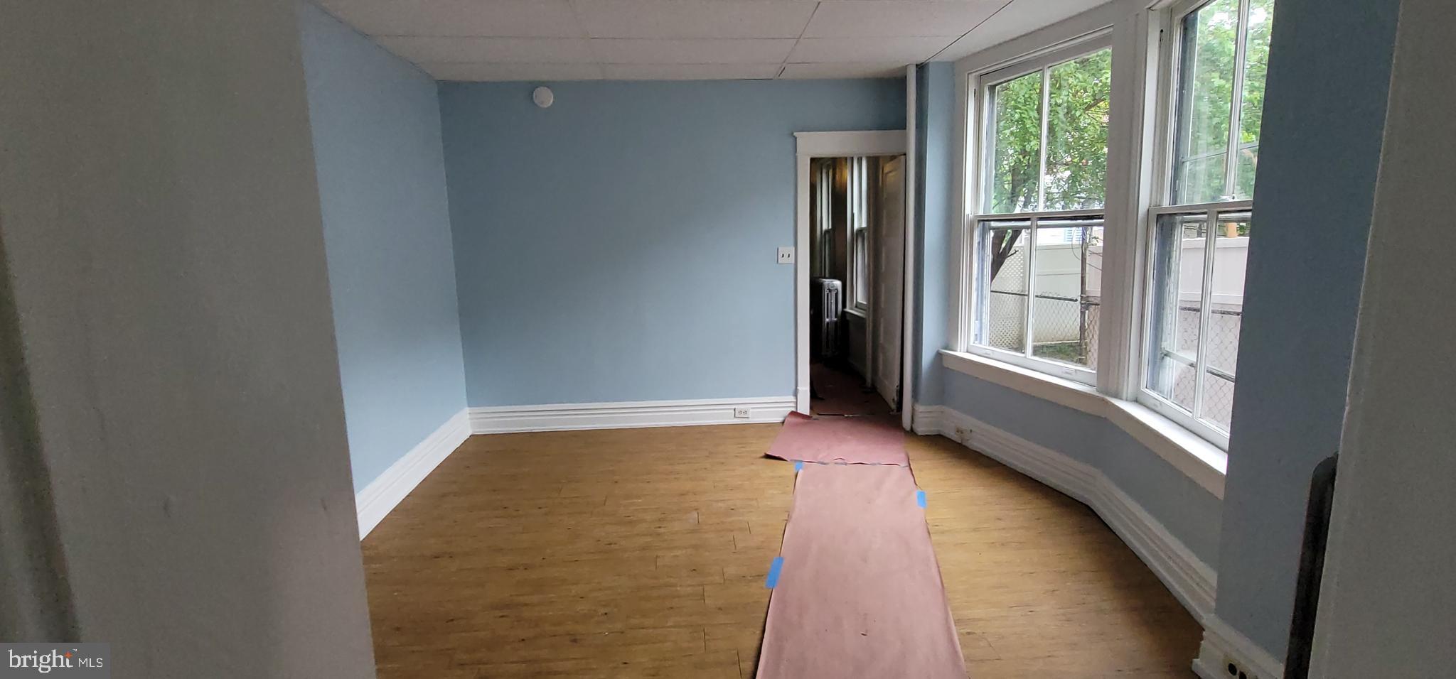 324 Spring Street, Unit 1 Reading, PA 19601 - Photo 32 of 45 a view of an empty room with a window