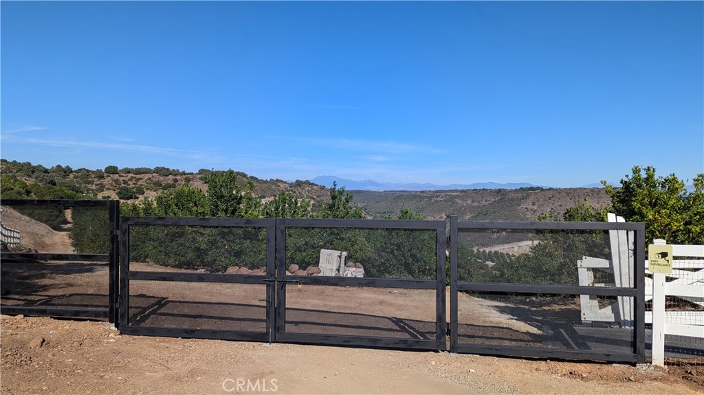 27 Vía Escalon Temecula, CA 92590 - Photo 15 of 17 a view of a terrace with a bench
