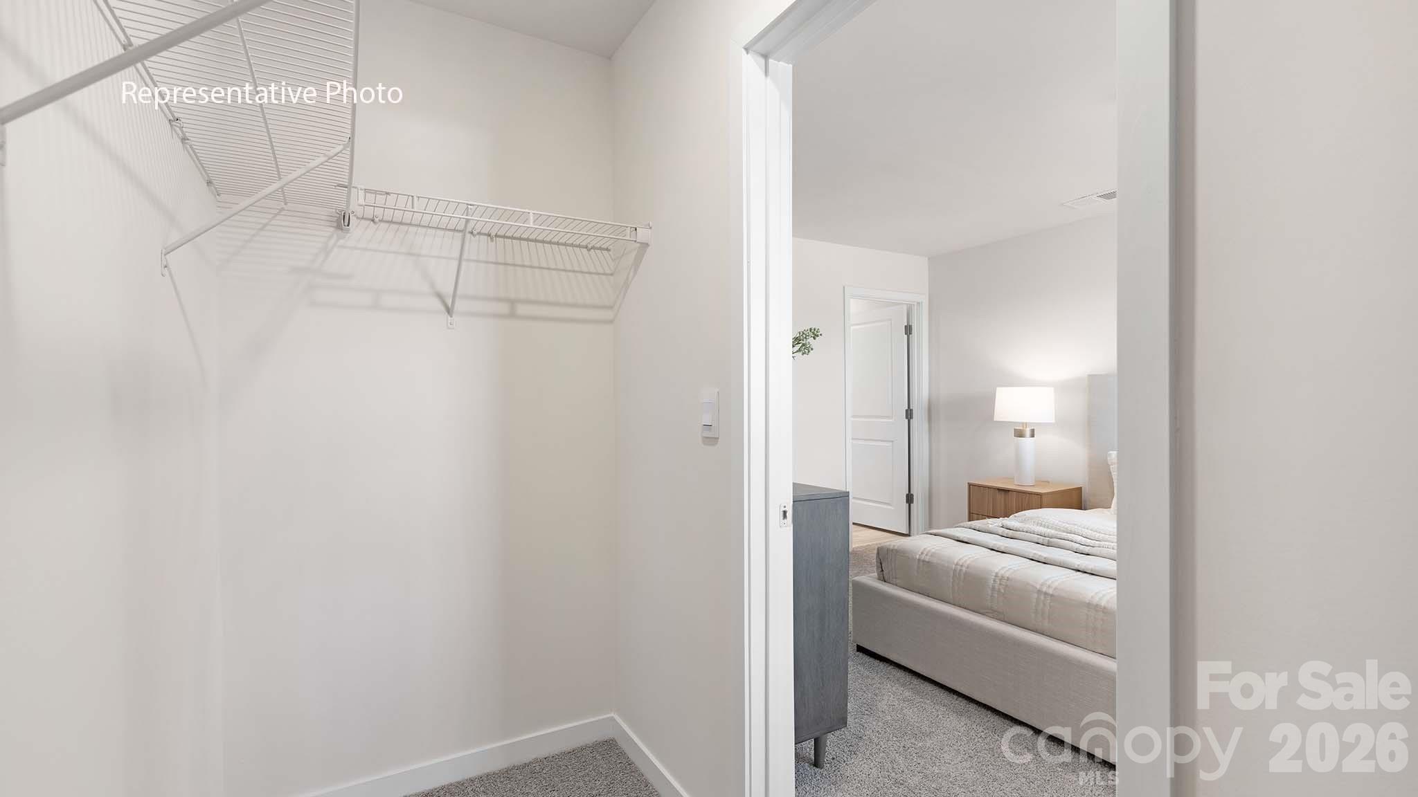 107 Parmiter Way, Unit B Troutman, NC 28166 - Photo 18 of 22 a bathroom with a bathtub and shower