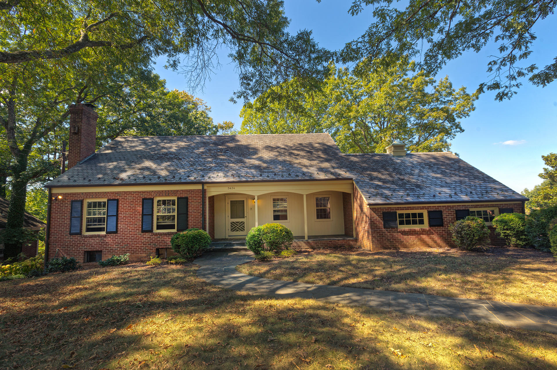 3434 West Ridge Circle Southwest Roanoke, VA 24014 - Photo 1 of 37 a front view of a house with garden