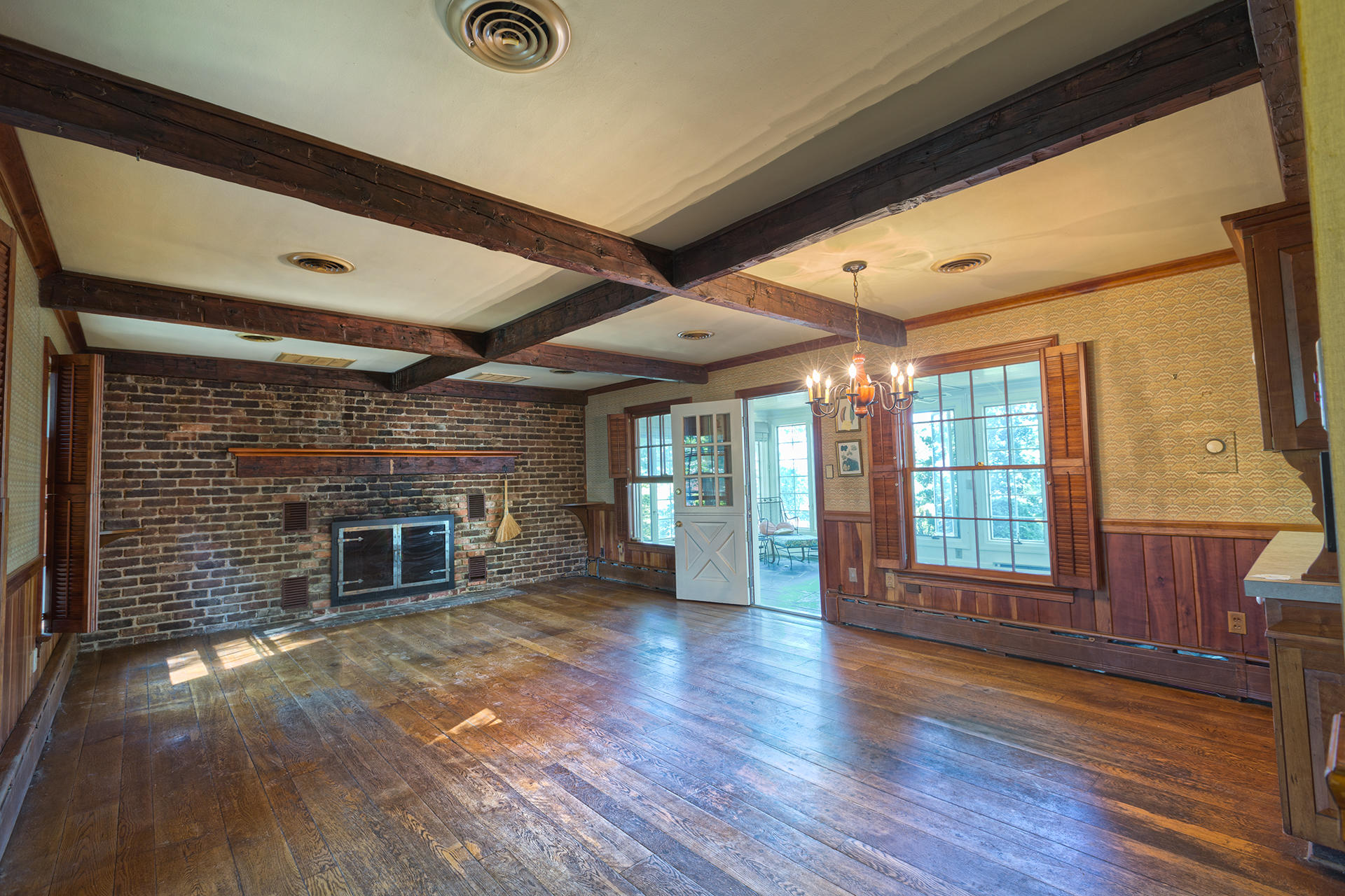 3434 West Ridge Circle Southwest Roanoke, VA 24014 - Photo 11 of 37 a view of a livingroom with wooden floor and a fireplace