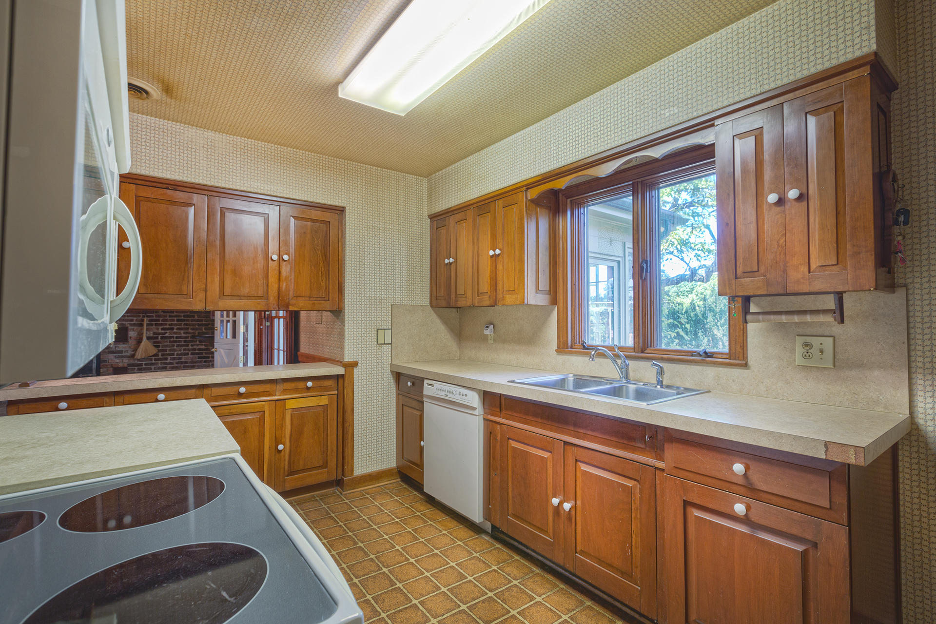 3434 West Ridge Circle Southwest Roanoke, VA 24014 - Photo 15 of 37 a kitchen with stainless steel appliances granite countertop a sink and cabinets