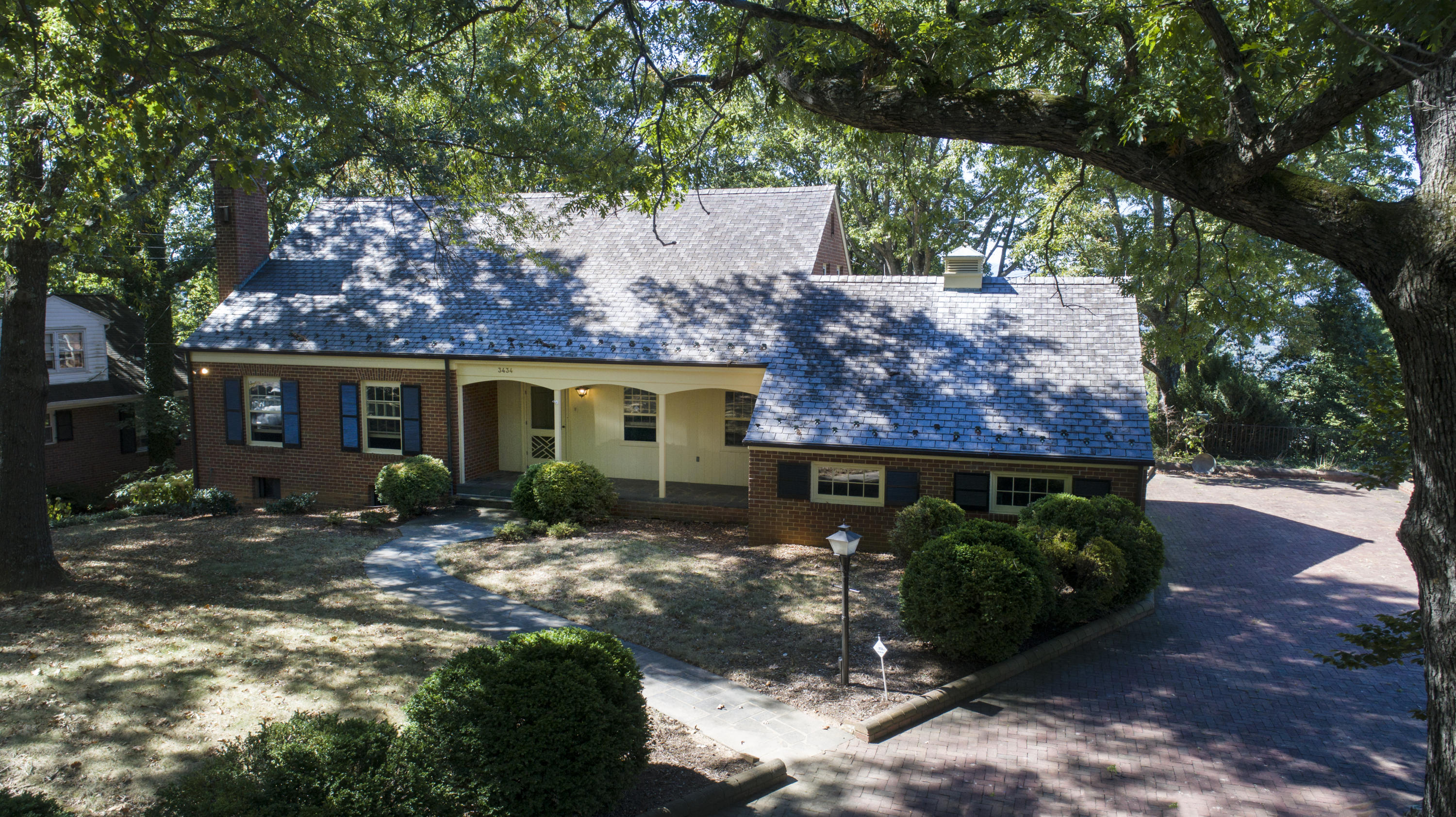 3434 West Ridge Circle Southwest Roanoke, VA 24014 - Photo 29 of 37 a view of a house with backyard garden and patio