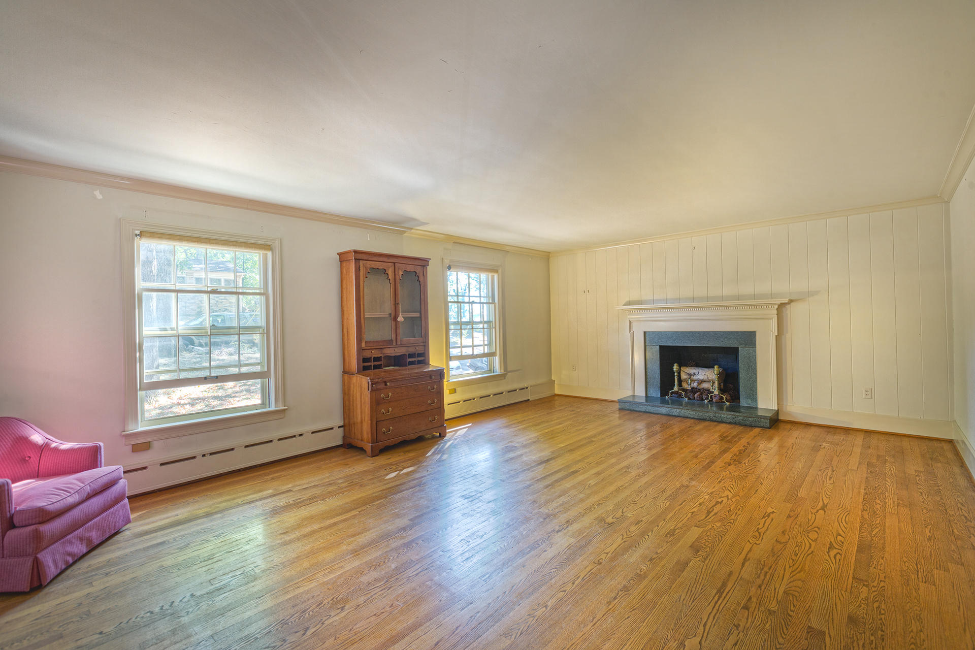 3434 West Ridge Circle Southwest Roanoke, VA 24014 - Photo 8 of 37 an empty room with fireplace wooden floor and windows