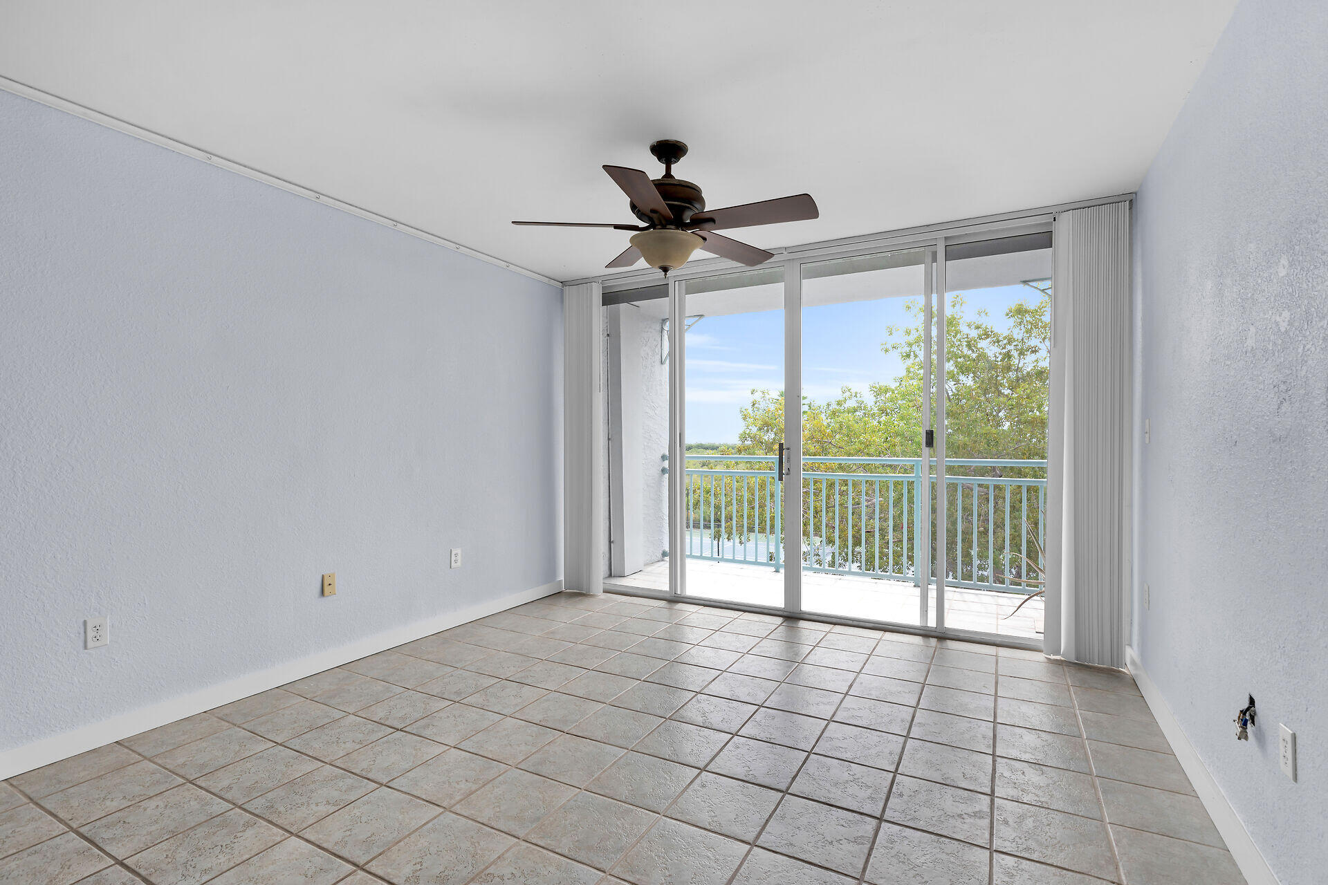 3635 Seaside Drive, Unit 206 Key West, FL 33040 - Photo 11 of 30 a view of an empty room with a window