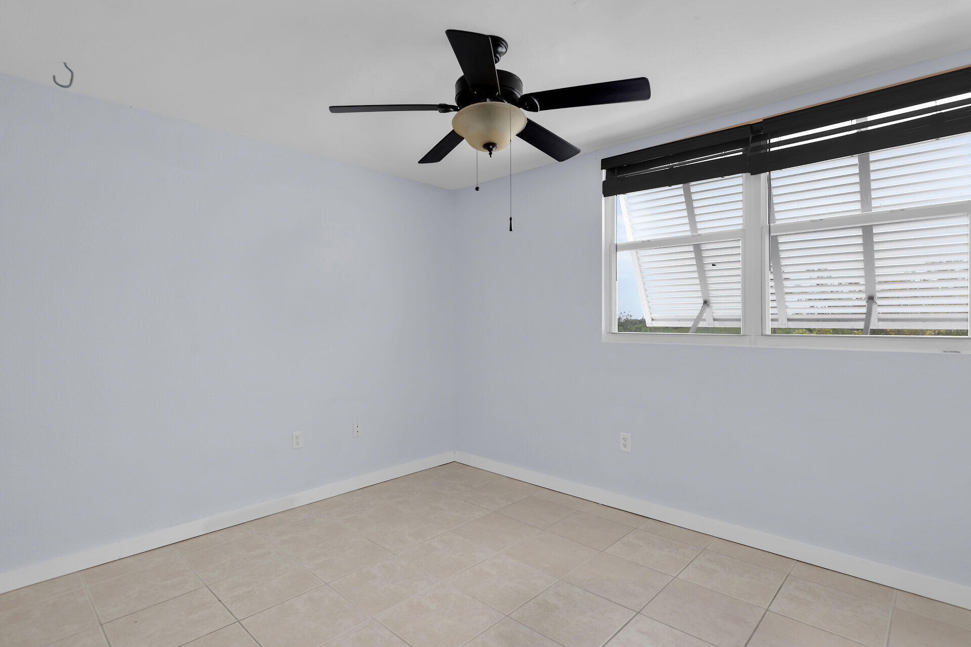 3635 Seaside Drive, Unit 206 Key West, FL 33040 - Photo 21 of 30 a view of an empty room with a window
