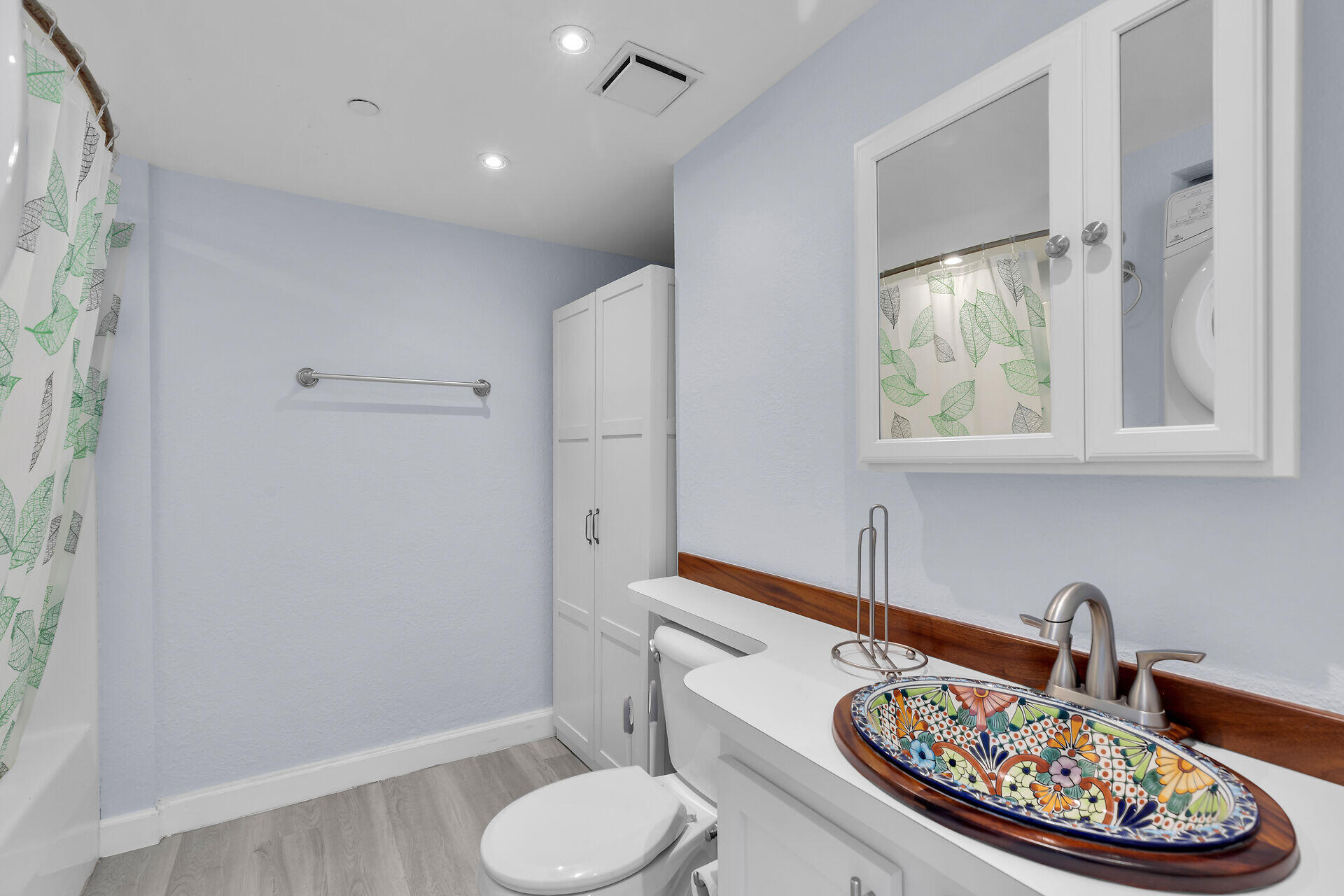 3635 Seaside Drive, Unit 206 Key West, FL 33040 - Photo 25 of 30 a bathroom with a sink a toilet and a mirror