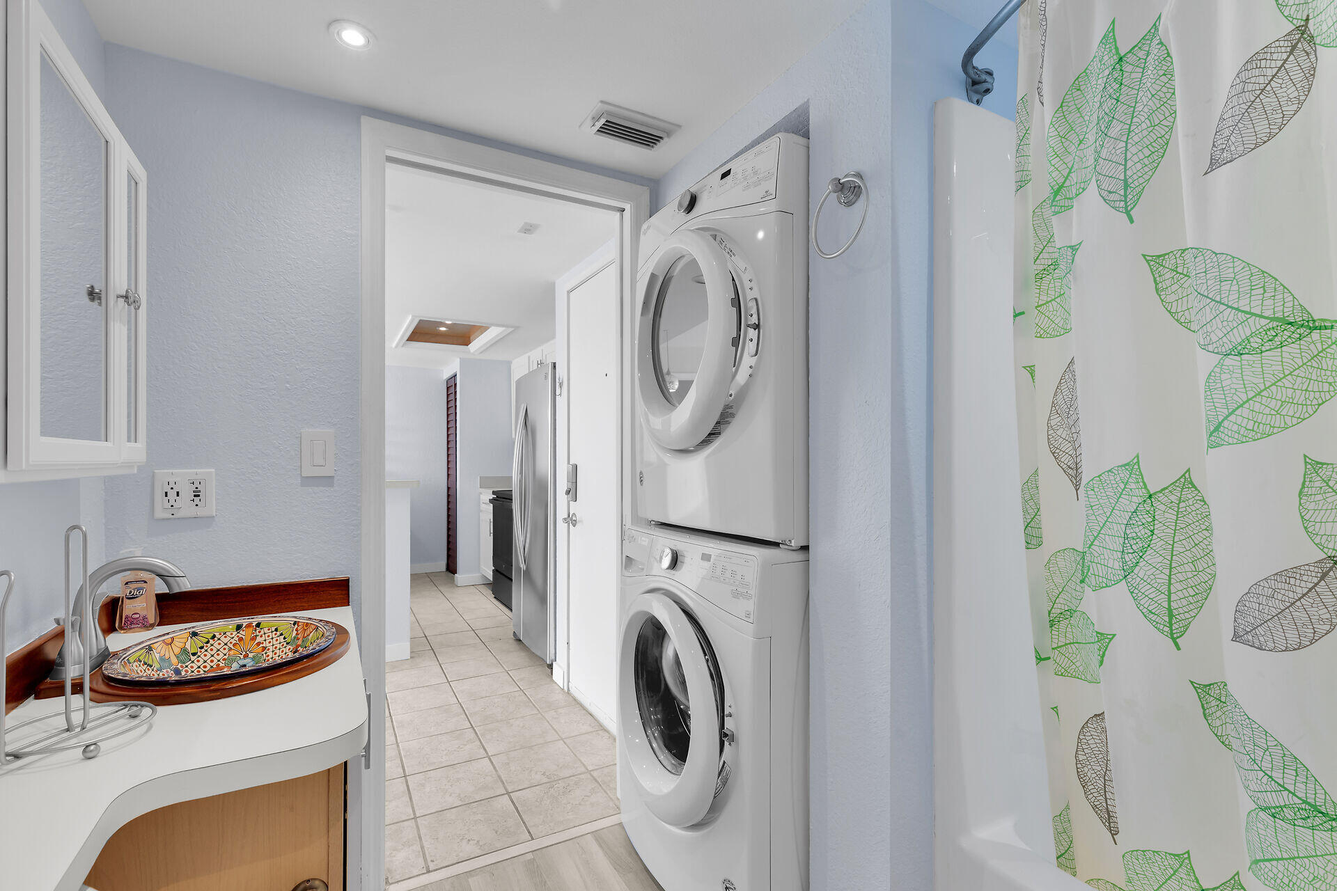 3635 Seaside Drive, Unit 206 Key West, FL 33040 - Photo 26 of 30 a utility room with dryer and washer