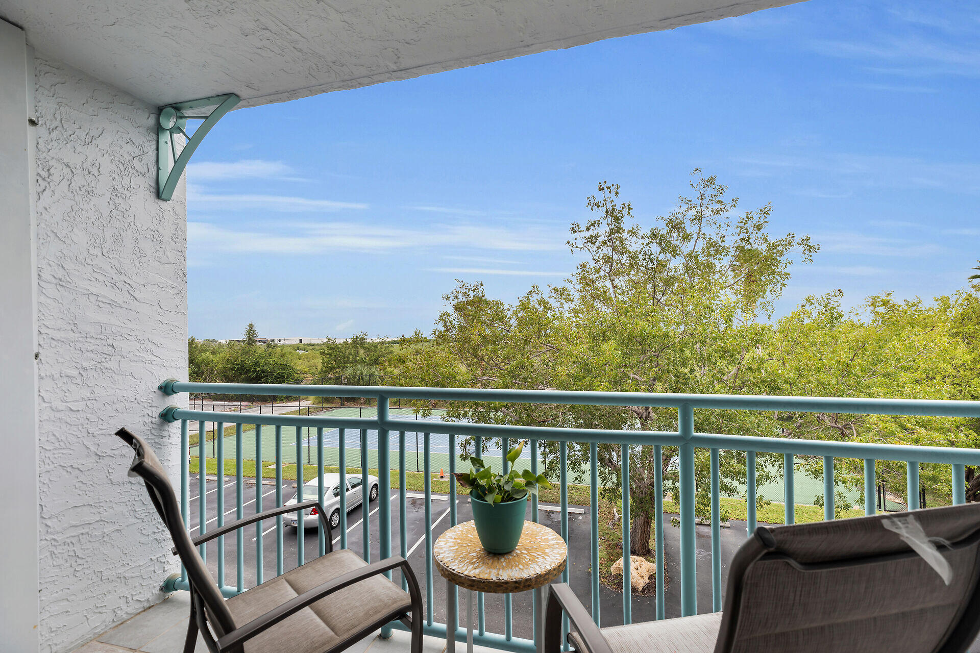 3635 Seaside Drive, Unit 206 Key West, FL 33040 - Photo 28 of 30 a view of a balcony with mountain view