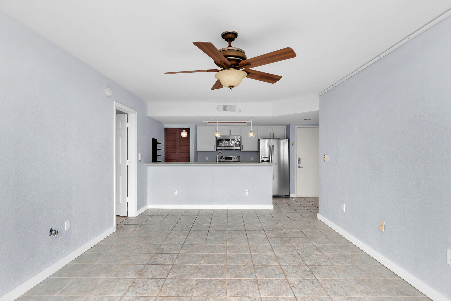 3635 Seaside Drive, Unit 206 Key West, FL 33040 - Photo 8 of 30 a view of a kitchen with a sink and cabinet