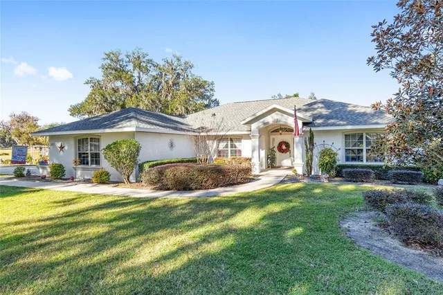 a white bath tub sitting next to a white sink