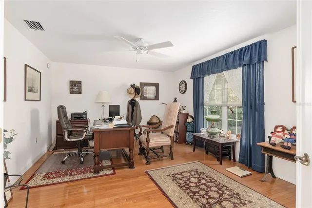 a bed room with furniture and a window