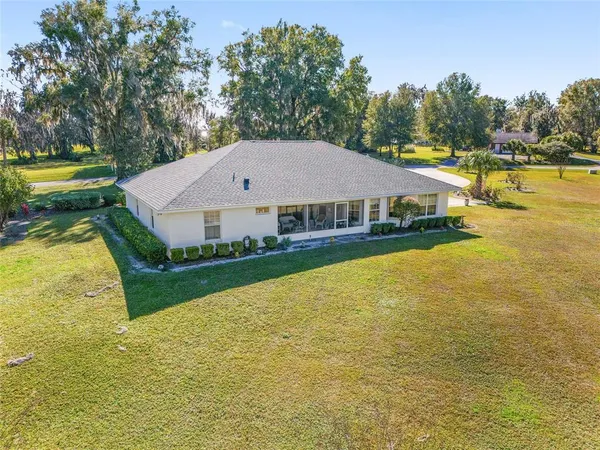 a view of a house with a swimming pool