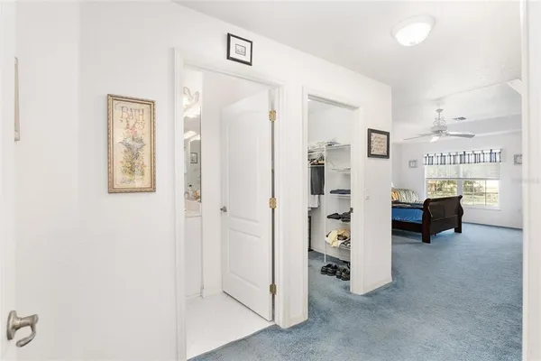 a bathroom with a double vanity sink mirror and shower