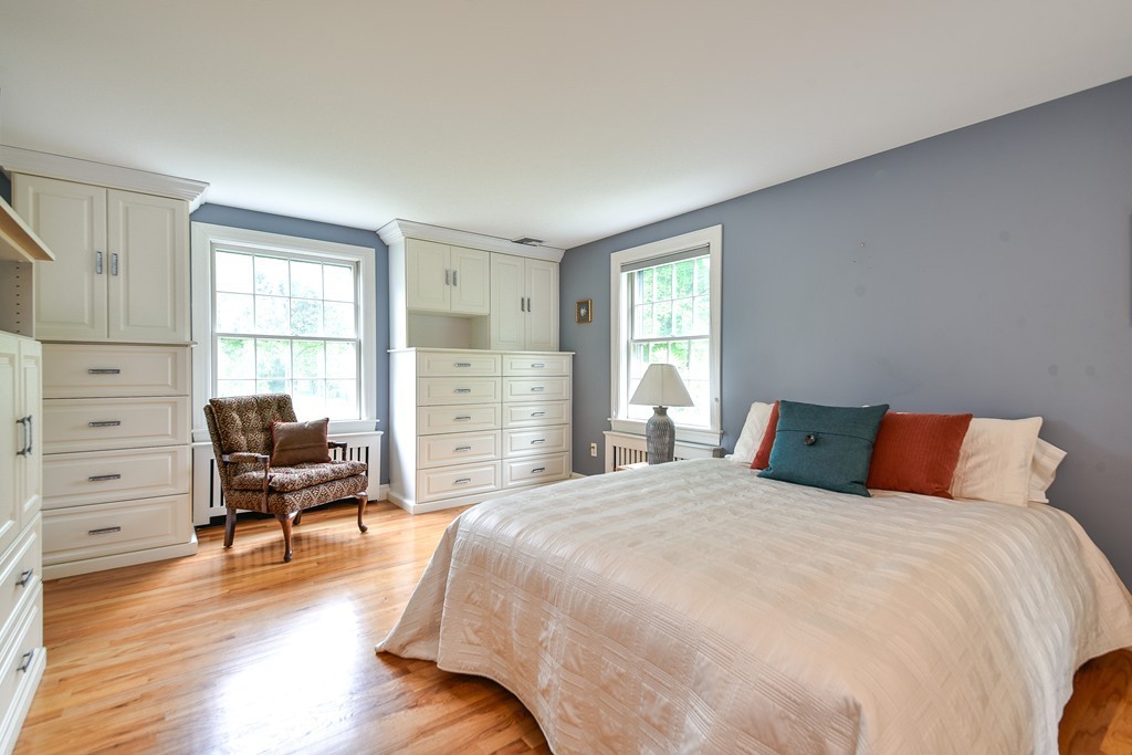 3 Woodfield Road Wellesley, MA 02482 - Photo 12 of 23 a bedroom with a bed and chair