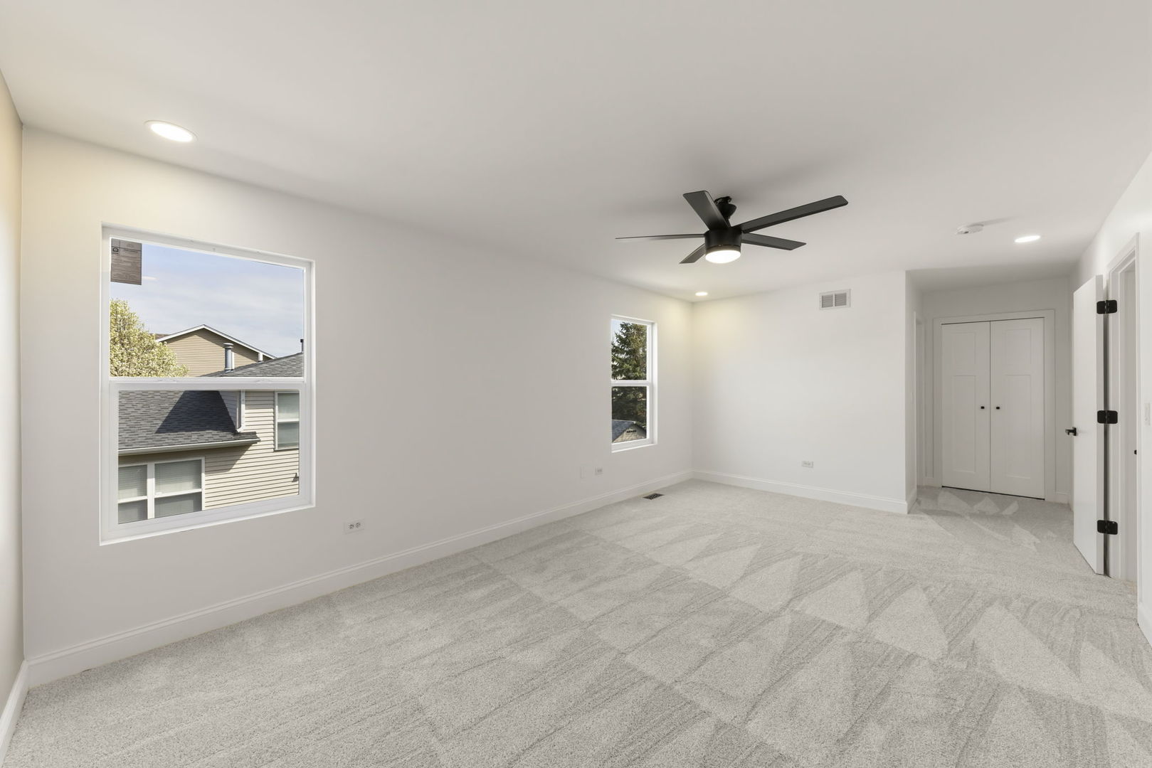 138 Chestnut Lane Bolingbrook, IL 60490 - Photo 12 of 26 an empty room with ceiling fan and window