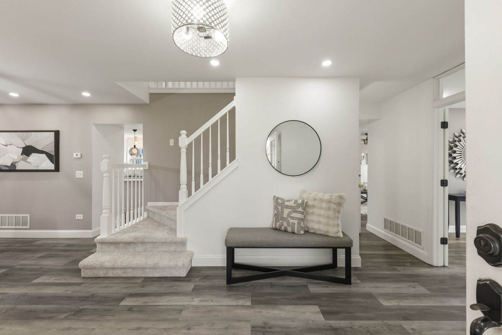 138 Chestnut Lane Bolingbrook, IL 60490 - Photo 2 of 26 a living room with furniture and a mirror