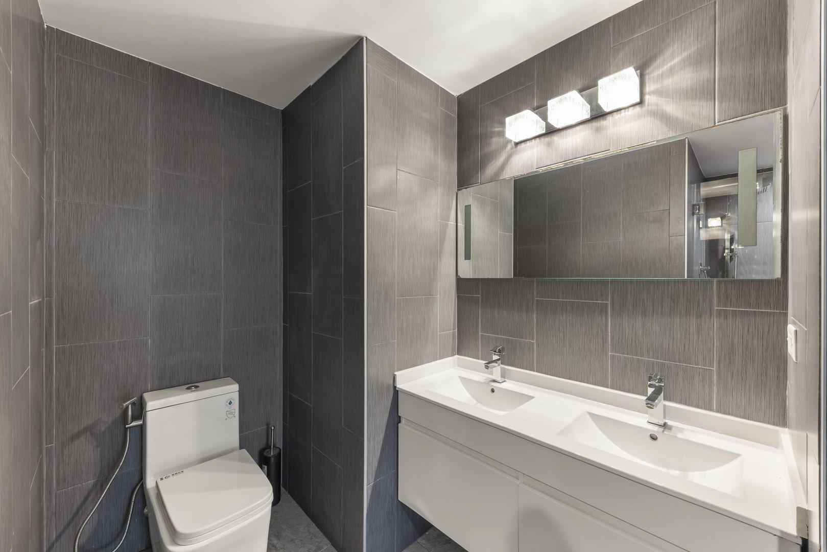 138 Chestnut Lane Bolingbrook, IL 60490 - Photo 21 of 26 a bathroom with a toilet sink and mirror