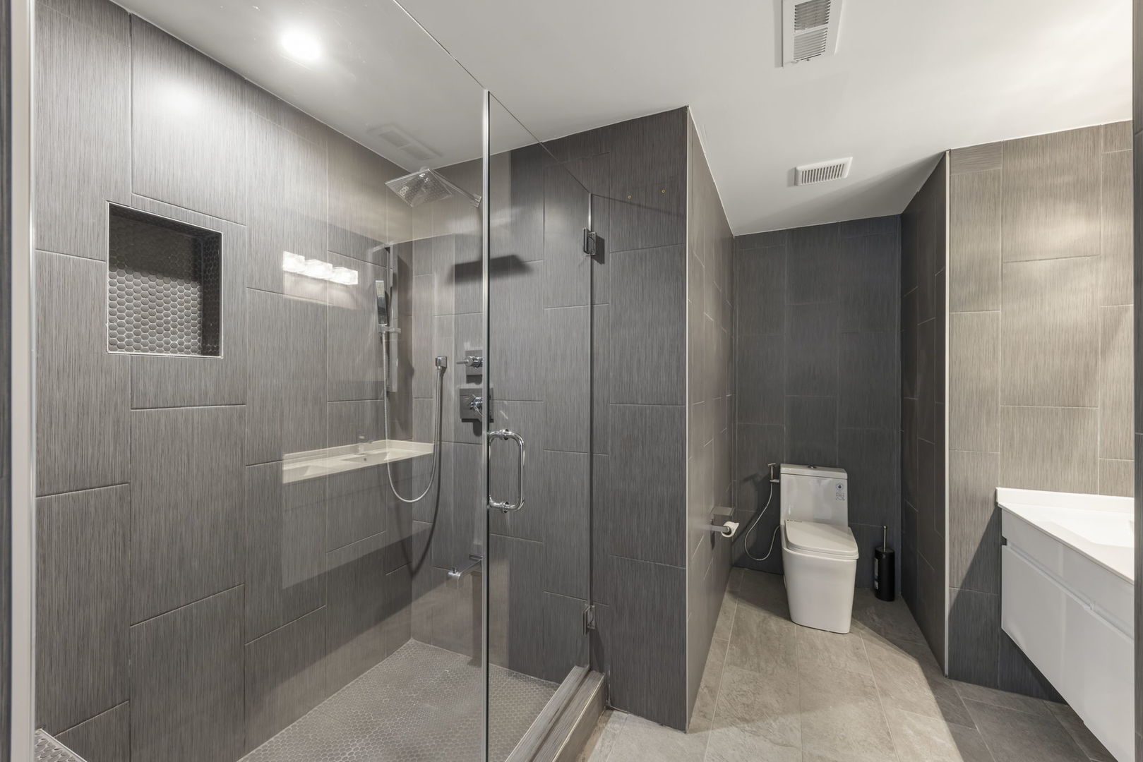 138 Chestnut Lane Bolingbrook, IL 60490 - Photo 22 of 26 a bathroom with a shower a toilet and a sink
