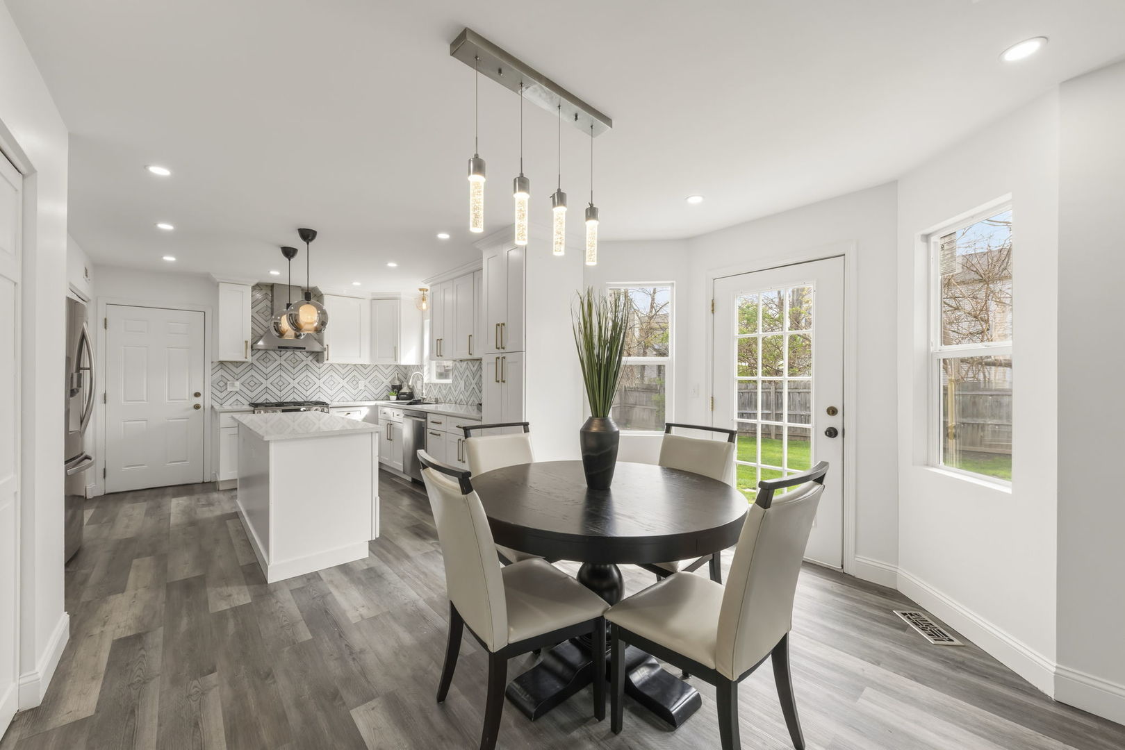 138 Chestnut Lane Bolingbrook, IL 60490 - Photo 6 of 26 a view of a dining room with furniture and wooden floor