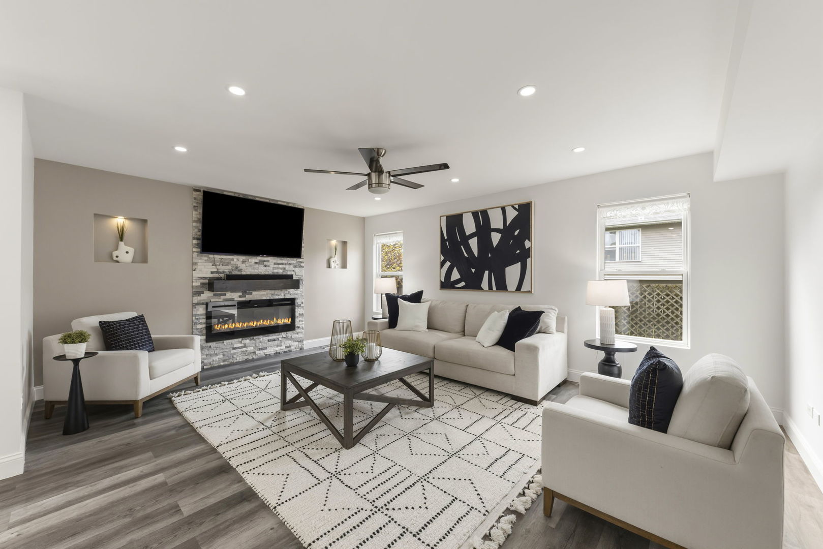 138 Chestnut Lane Bolingbrook, IL 60490 - Photo 7 of 26 a living room with furniture and a flat screen tv