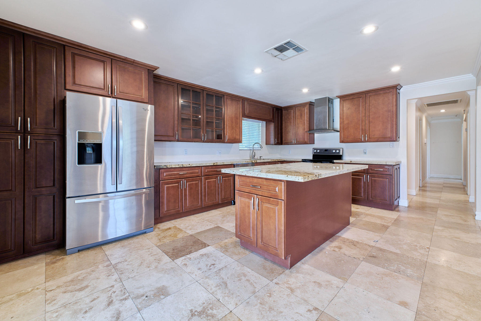 83175 Rue Paray Thermal, CA 92274 - Photo 17 of 44 a kitchen with stainless steel appliances granite countertop a stove a refrigerator and a sink