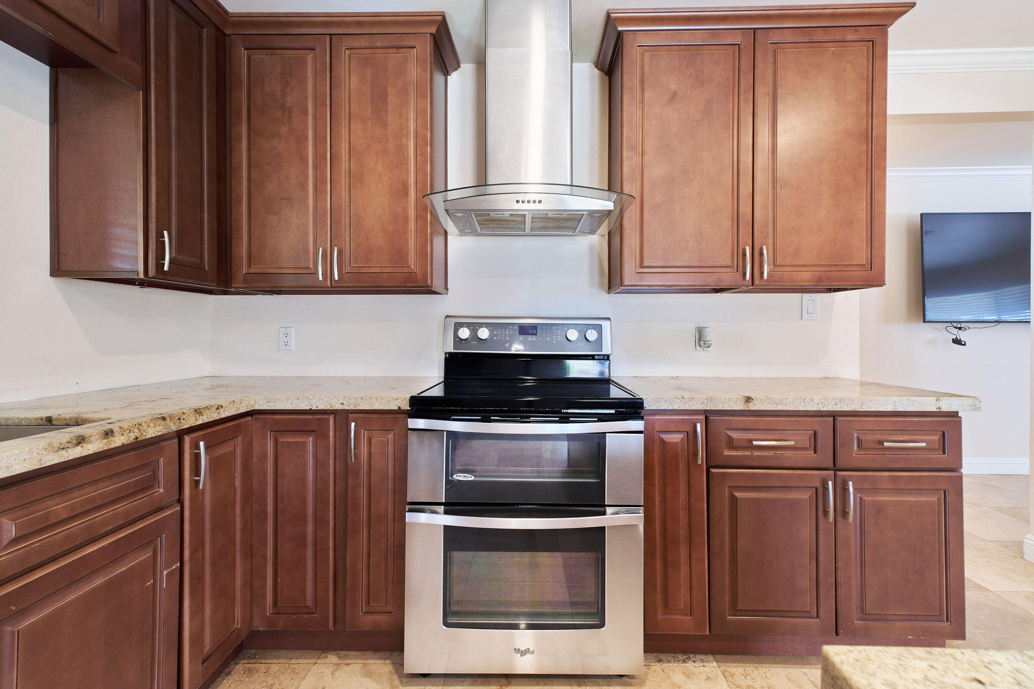 83175 Rue Paray Thermal, CA 92274 - Photo 20 of 44 a kitchen with granite countertop a stove and a sink