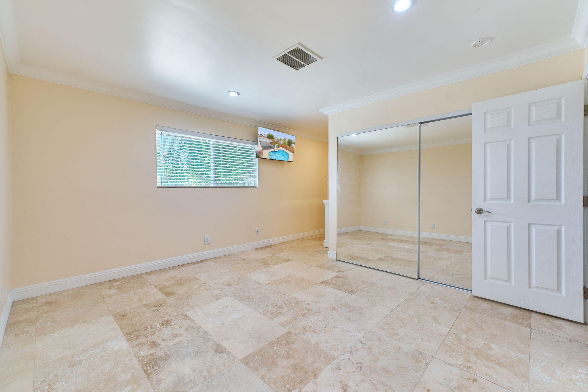 83175 Rue Paray Thermal, CA 92274 - Photo 34 of 44 an empty room with windows and closet