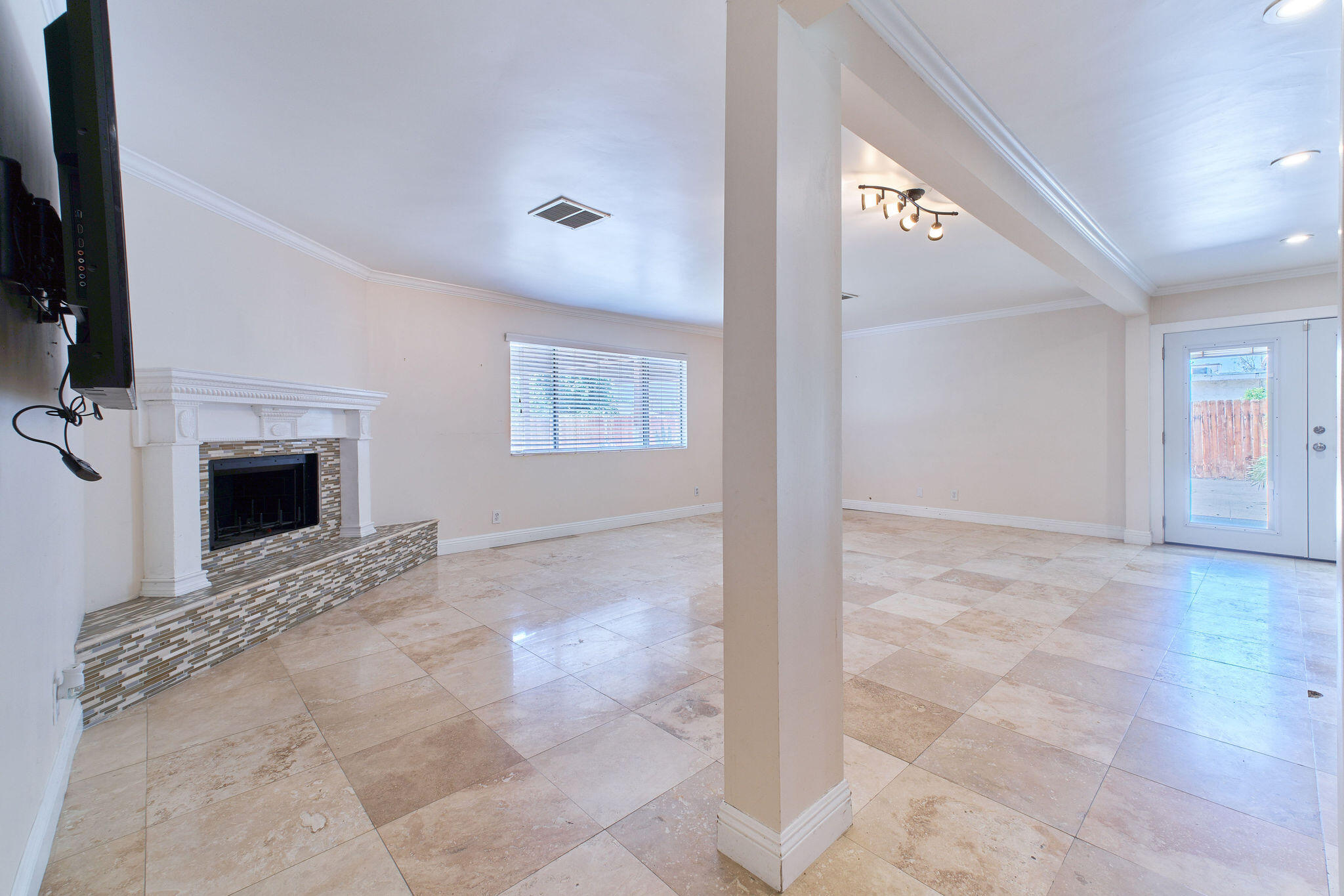 83175 Rue Paray Thermal, CA 92274 - Photo 42 of 44 a view of livingroom with fireplace and window