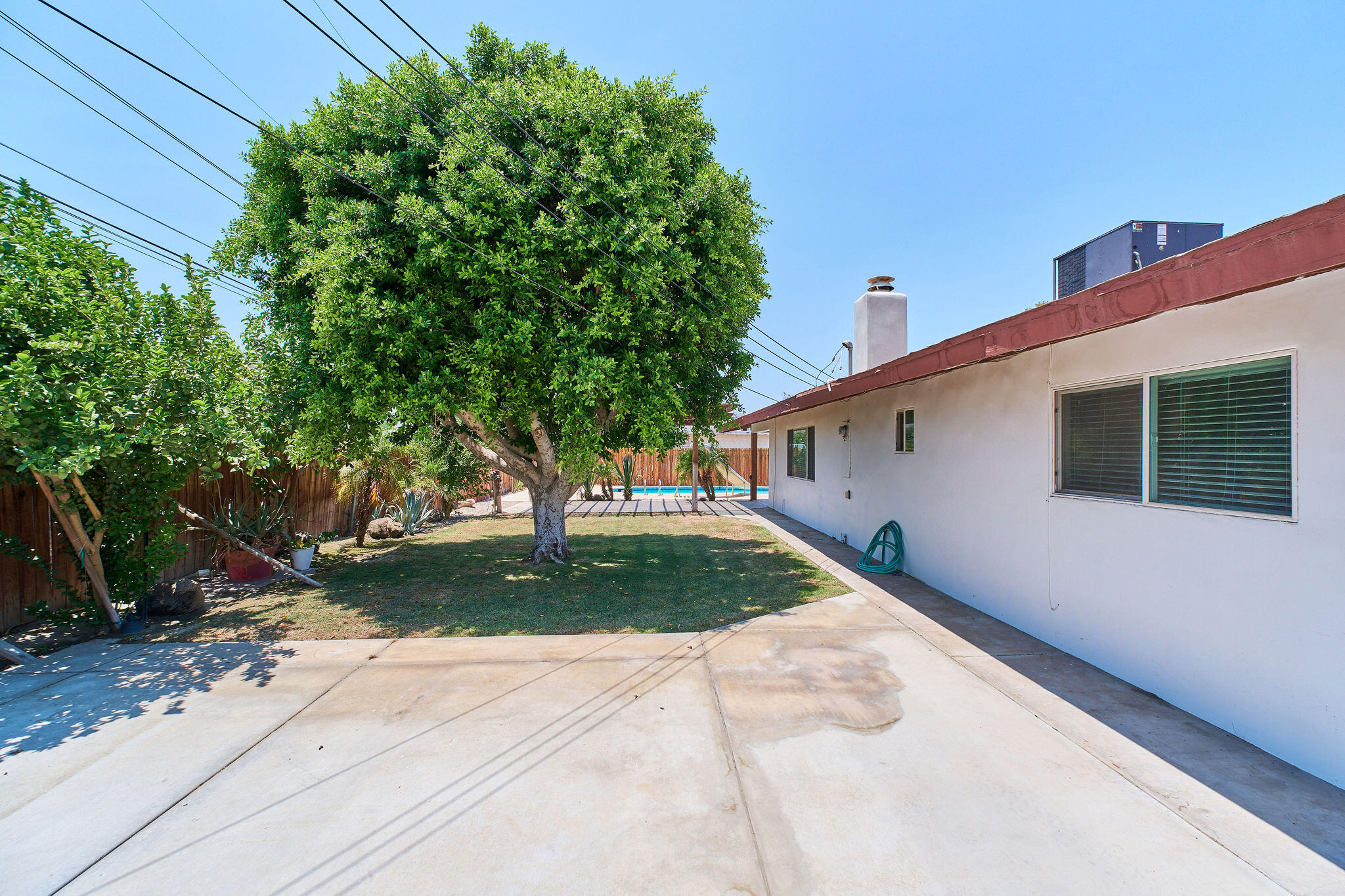83175 Rue Paray Thermal, CA 92274 - Photo 7 of 44 a backyard of a house with lots of green space