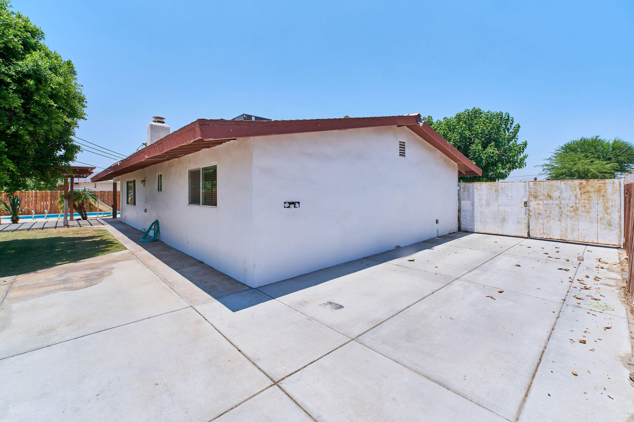 83175 Rue Paray Thermal, CA 92274 - Photo 8 of 44 a view of house with backyard